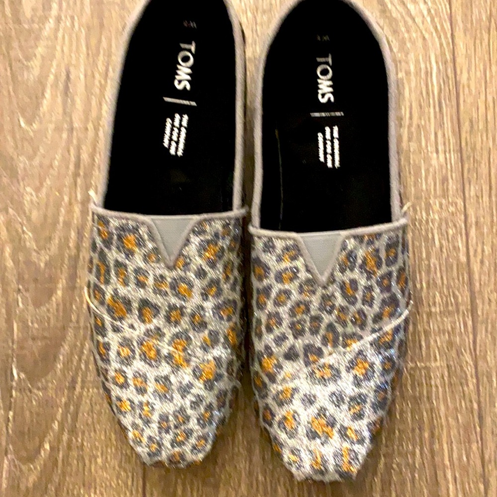 Like New glittery cheetah print Tom’s! Perfect for a holiday party!